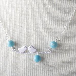 Silver Bird And Branch Necklace With Blue Fossil..