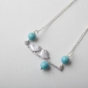 Silver Bird And Branch Necklace With Blue Fossil..